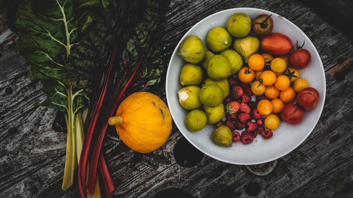 fruits on white ceramic bowl